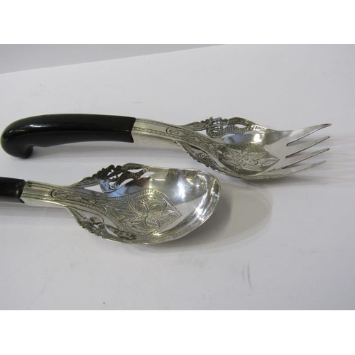 47 - EASTERN SERVERS, pair of Eastern silver servers with engraved decoration, hardwood handles, also a G... 