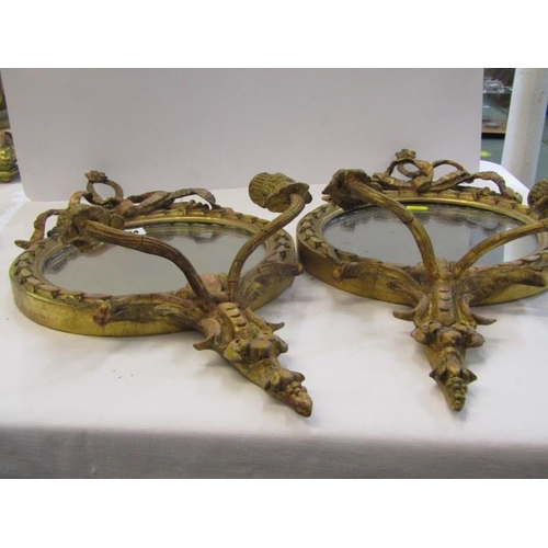 534 - ANTIQUE GIRANDOLES, pair of circular gilt framed twin branch girandoles with ribbon cresting, 56cm h... 