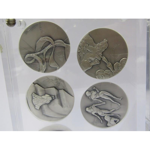 66 - SALVADOR DALI, set of silver medallions 