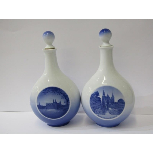 4 - ROYAL COPENHAGEN, a pair of Royal Copenhagen bottles & stoppers with Danish views, 24cms