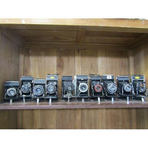 70 - VINTAGE CAMERAS, selection of 10 bellow action black fibre cameras including various Ensign, Zeiss, ... 