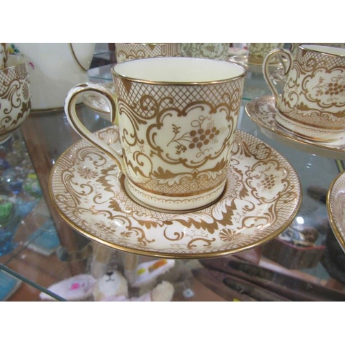 83 - CROWN STAFFORDSHIRE COFFEE WARE, gilt and floral decorated coffee service with 6 settings