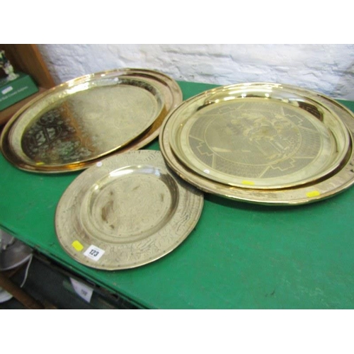 123 - EASTERN BRASSWARE, collection of mainly Eastern embossed and engraved brass trays