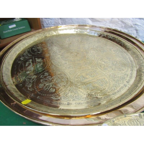 123 - EASTERN BRASSWARE, collection of mainly Eastern embossed and engraved brass trays