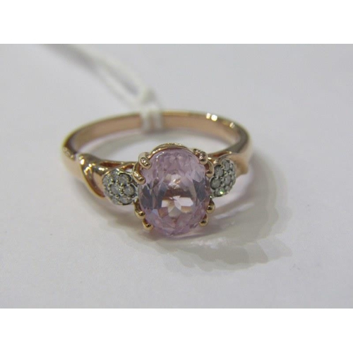 130 - DIAMOND & KUNZITE RING, 18ct yellow gold ring, set a large oval kunzite, flanked by 2 diamonds, size... 