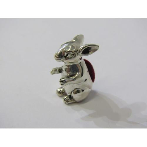 132 - NOVELTY PIN CUSHION, silver pin cushion in the form of a seated rabbit