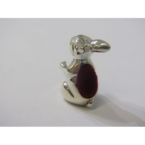 132 - NOVELTY PIN CUSHION, silver pin cushion in the form of a seated rabbit