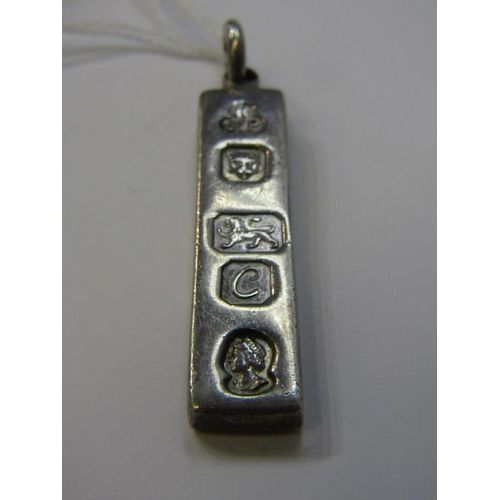 138 - SILVER JEWELLERY, silver ingot pendant, Elizabeth II, London HM, 31.5 grams, also a silver framed ca... 