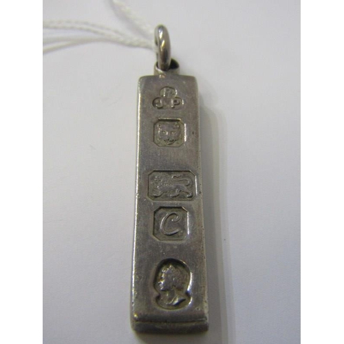 138 - SILVER JEWELLERY, silver ingot pendant, Elizabeth II, London HM, 31.5 grams, also a silver framed ca... 