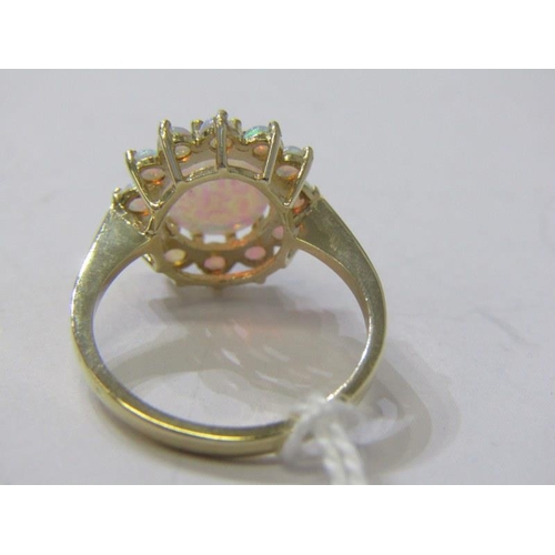 159 - OPAL CLUSTER RING, 9ct yellow gold ring set a large cabochon opal to centre, set 12 further opals to... 