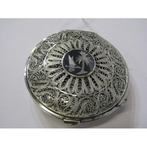 170 - MIDDLE EASTERN SILVER COMPACT, foliate decorated compact, central cartouche decorated palm and dhow,... 