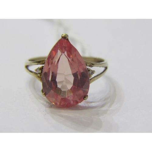 181 - 9ct GOLD RING, 9ct yellow gold ring, set a pear shaped stone, possibly morganite, with diamonds to e... 