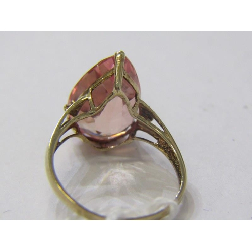 181 - 9ct GOLD RING, 9ct yellow gold ring, set a pear shaped stone, possibly morganite, with diamonds to e... 