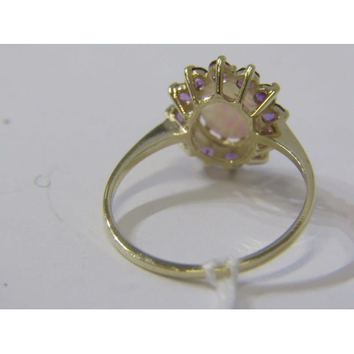 203 - OPAL & AMETHYST RING, 9ct yellow gold ring, set a central opal surrounded by a cluster of amethysts,... 