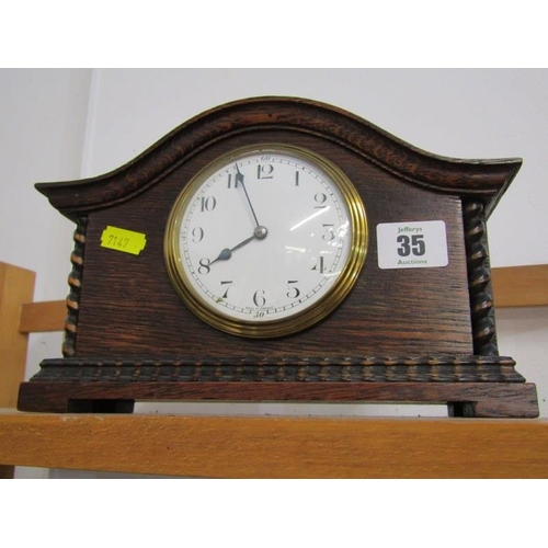 35 - EDWARDIAN MANTEL CLOCK, oak cased mantel clock with barley twist column decoration