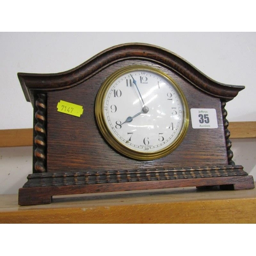 35 - EDWARDIAN MANTEL CLOCK, oak cased mantel clock with barley twist column decoration