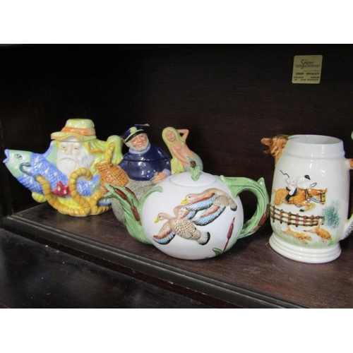 43 - DECORATIVE TEA POTS, 5 novelty tea pots and hunting jug