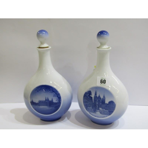 60 - ROYAL COPHENHAGEN, pair of Royal Copenhagen bottles and stoppers with Danish views, 24cm height