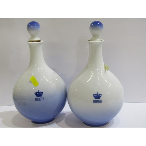 60 - ROYAL COPHENHAGEN, pair of Royal Copenhagen bottles and stoppers with Danish views, 24cm height