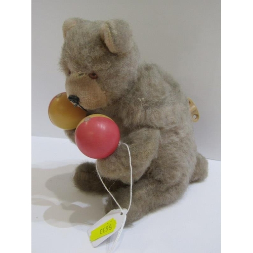 66 - VINTAGE CLOCKWORK PERFORMING BEAR