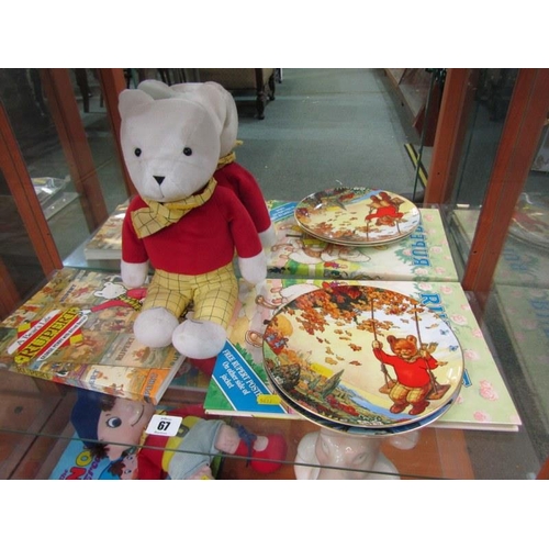 67 - RUPERT BEAR, 2 Wedgwood plates, soft toy and 2 related books