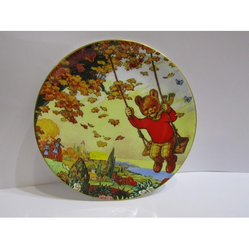 67 - RUPERT BEAR, 2 Wedgwood plates, soft toy and 2 related books