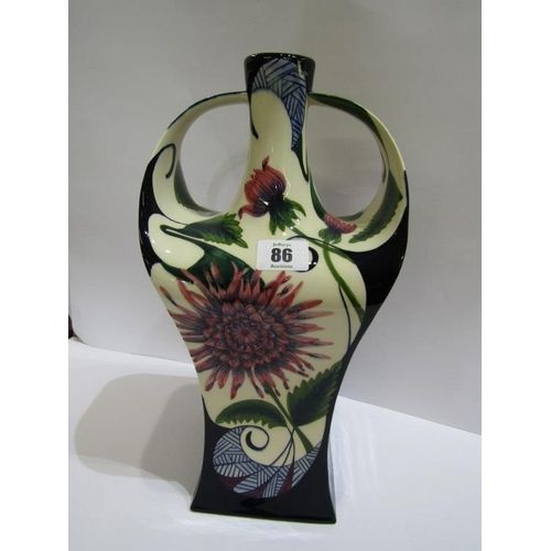 86 - COBRIDGE, Trial design twin handled square body vase, decorated with blossoms and foliage, 34cm heig... 