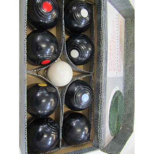 90 - ORIGINAL BOXED CARPET BOWLS, by B & A, together with vintage biscuitier