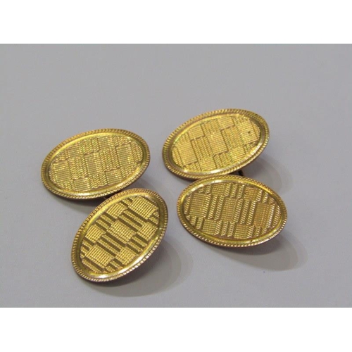 33 - CUFF LINKS, pair of 9ct gold oval cuff links with engine turned decoration, 5.5 grams in fitted case