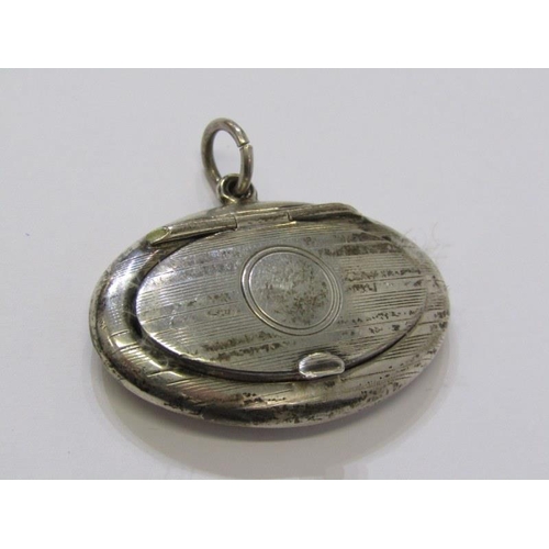 35 - 2 SIMILAR SILVER MINIATURE COMPACTS, of oval form, each with engine turned decoration, 4.5cm width, ... 