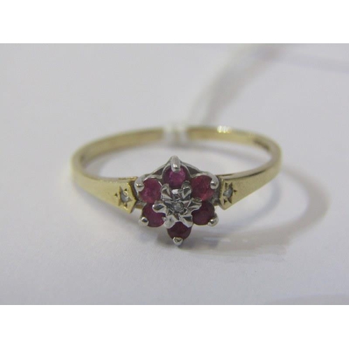 52 - RUBY & DIAMOND CLUSTER RING, 9ct gold ring, set a central diamond, surrounded by a cluster of 6 rubi... 