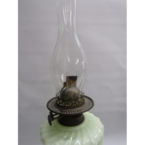 117 - EDWARDIAN OIL LAMP, brass circular base oil lamp with milk glass reservoir