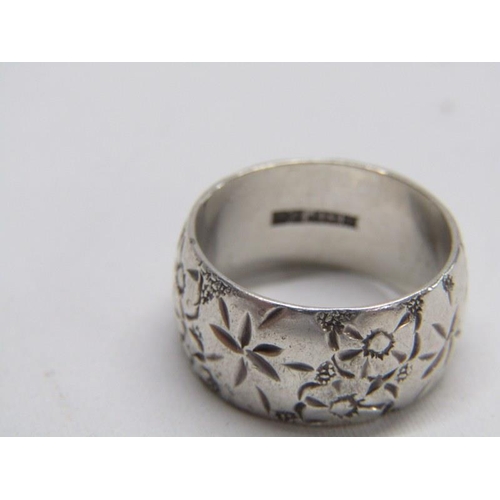 160 - 3 SILVER RINGS, silver band ring with foliate decoration, together with 2 other silver fancy rings, ... 