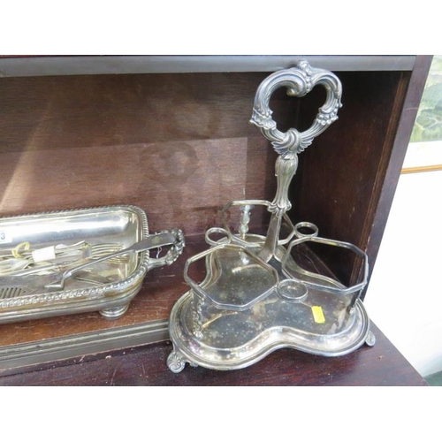 63 - SILVERPLATE, Victorian decanter stand, sugar tongs, wine funnel & contents of shelf