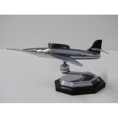 1 - ART DECO, a chromed jet plane table lighter with patent inset plaque on base, 23cm length