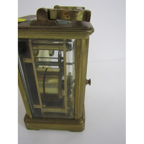 107 - CARRIAGE CLOCK, brass cased carriage clock with bevelled glass panels, 12cm height