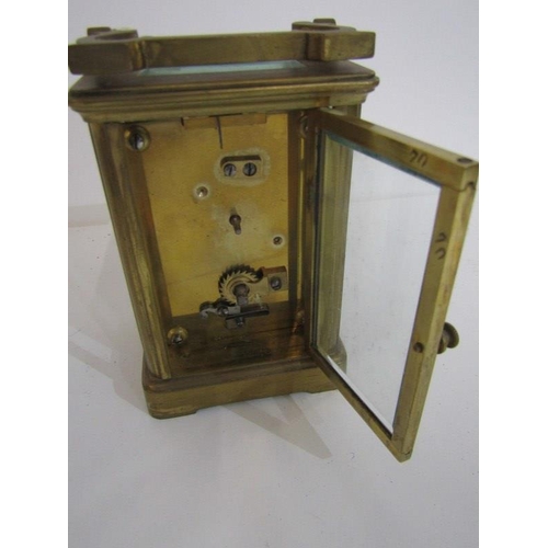 107 - CARRIAGE CLOCK, brass cased carriage clock with bevelled glass panels, 12cm height