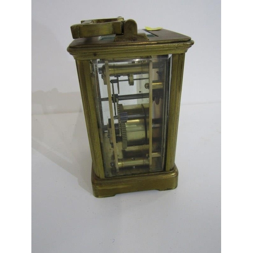 107 - CARRIAGE CLOCK, brass cased carriage clock with bevelled glass panels, 12cm height