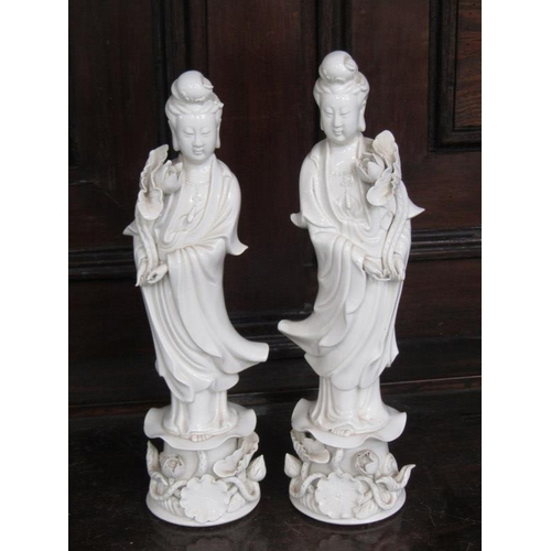 14 - ORIENTAL CERAMICS, pair of Blanc de chine deity figures 32cm height