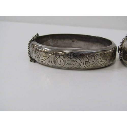 150 - SILVER BANGLES, 3 silver hinged bangles with foliate decoration