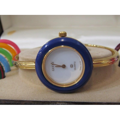 165 - GUCCI, Gucci boxed lady's dress wrist watch with interchangeable bezels