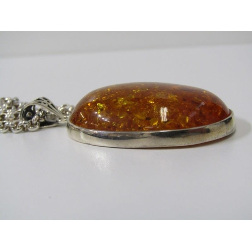 172 - AMBER STYLE PENDANT, large oval pendant in silver  mount, on 18