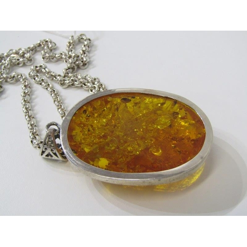 172 - AMBER STYLE PENDANT, large oval pendant in silver  mount, on 18