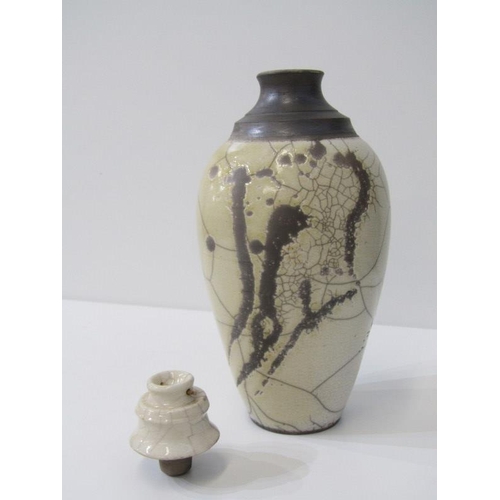 2 - STUDIO POTTERY, Raku glazed decanter bottle together with 15cm lidded Studio Pottery jar