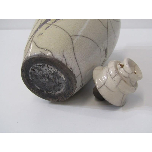 2 - STUDIO POTTERY, Raku glazed decanter bottle together with 15cm lidded Studio Pottery jar