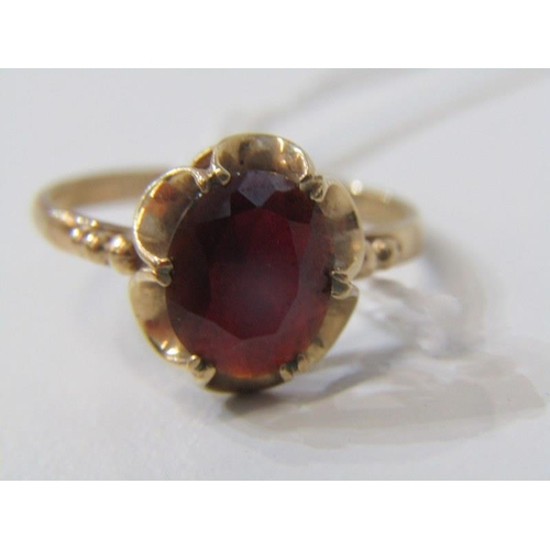 206 - GARNET RING, 9ct yellow gold ring set an oval garnet, size O