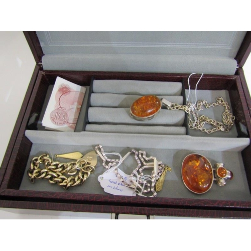 396 - AMBER JEWELLERY, silver and amber pendant on curb link silver chain, also 1 other amber pendant, a s... 