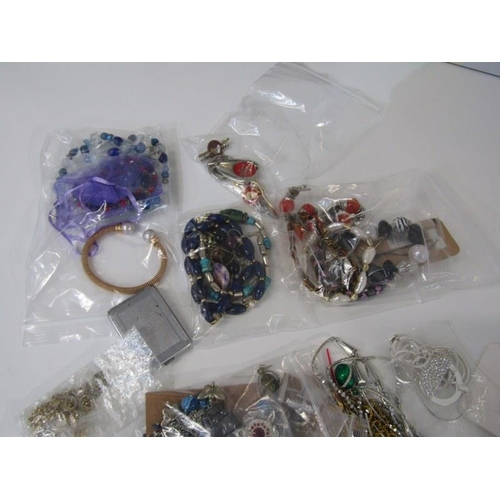 397 - COSTUME JEWELLERY, selection of bagged costume jewellery, including beaded necklaces, bracelets, sil... 