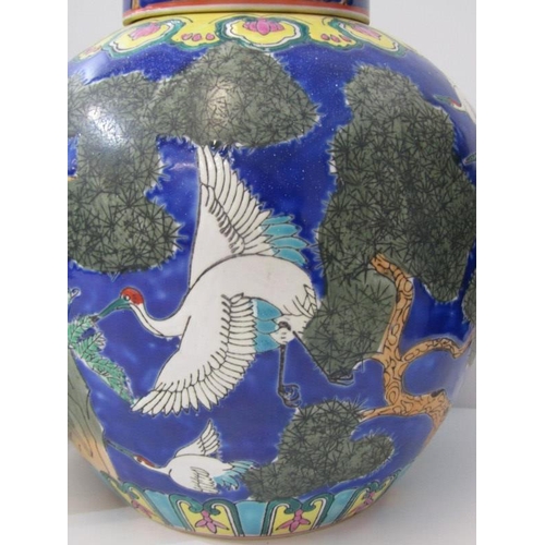 43 - ORIENTAL CERAMICS, pair of modern lidded ginger jars decorated with cranes 28cm height