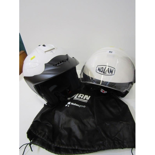 82 - MOTOR CYCLE HELMETS, Nolan helmet and 1 other, 'unused' Size M